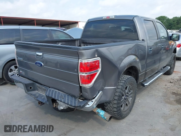 2014 Ford F-150 XL with VIN 1FTFW1CTXEKF35966, listed as a IAAI auction lot 42120360 with 140,174 mi miles and . Bid and sale history available at DreamBid. Image 4.