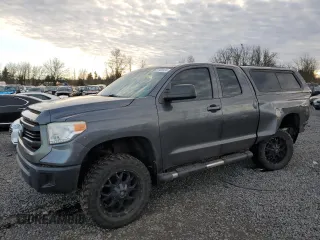 2015 Toyota Tundra 4WD Truck SR with VIN 5TFUM5F15FX063047, listed as a Copart auction lot 87409124 with 122,877 mi miles and Salvage Title. Bid and sale history available at carsss.com. Image 1.