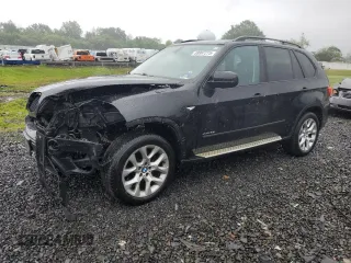 2012 BMW X5 35i с VIN 5UXZV4C57CL765053, выставлен на аукционе Copart как лот 59997275 с пробегом 157 943 миль миль и Списание • Salvage title. История ставок и продаж доступна на DreamBid. Изображение 1.