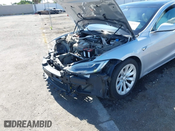 2016 Tesla Model S 90D with VIN 5YJSA1E22GF174637, listed as a IAAI auction lot 42234083 with 142,915 mi miles and . Bid and sale history available at DreamBid. Image 20.
