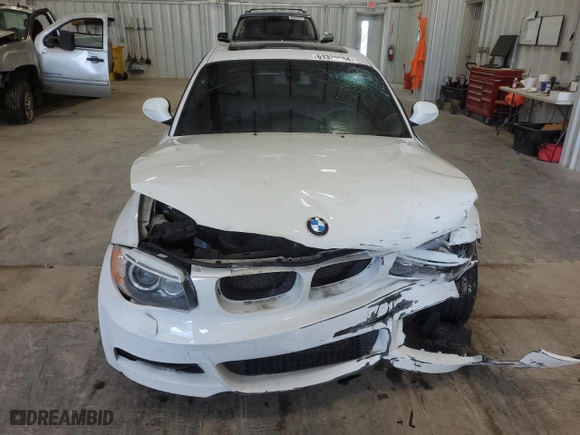 2013 BMW 1 Series 135i with VIN WBAUC9C52DVY60511, listed as a Copart auction lot 61339084 with 0 mi miles and Non Repairable. Bid and sale history available at carsss.com. Image 5.