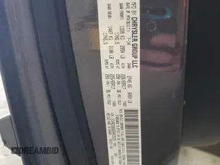 2014 Dodge Grand Caravan SE with VIN 2C4RDGBG6ER463529, listed as a Copart auction lot 51830695 with 105,675 mi miles and Salvage Title. Bid and sale history available at DreamBid. Image 13.