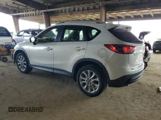 2014 Mazda CX-5 Grand Touring with VIN JM3KE2DY5E0383597, listed as a Copart auction lot 50205545 with 110,052 mi miles and Salvage Title. Bid and sale history available at carsss.com. Image 2.