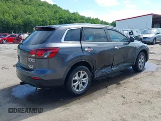 2014 Mazda CX-9 Touring with VIN JM3TB3CV9E0426767, listed as a IAAI auction lot 42301021 with 129,497 mi miles and . Bid and sale history available at DreamBid. Image 4.