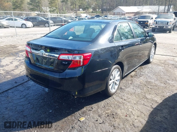 2013 Toyota Camry L with VIN 4T1BF1FK1DU666784, listed as a IAAI auction lot 41869487 with 99,396 mi miles. Bid and sale history available at carsss.com. Image 4.