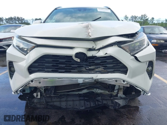 2019 Toyota RAV4 XLE with VIN 2T3W1RFV5KC028164, listed as a IAAI auction lot 42002503 with 79,346 mi miles. Bid and sale history available at carsss.com. Image 6.