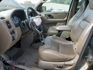 2001 Ford Escape XLT with VIN 1FMCU04181KF62444, listed as a Copart auction lot 55272615 with 265,129 mi miles and Salvage title. Bid and sale history available at DreamBid. Image 7.