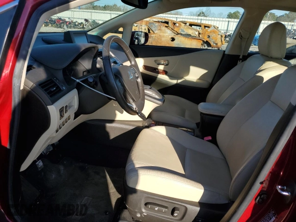 2010 Lexus HS 250h with VIN JTHBB1BA7A2021334, listed as a Copart auction lot 88048675 with 92,426 mi miles and Salvage Title. Bid and sale history available at DreamBid. Image 7.