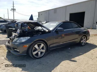 2011 Mercedes-Benz E 550 with VIN WDDKK7CFXBF086032, listed as a Copart auction lot 57750405 with 106,931 mi miles and Salvage title. Bid and sale history available at DreamBid. Image 1.