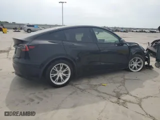 2021 Tesla Model Y Long Range with VIN 5YJYGDEEXMF079324, listed as a Copart auction lot 52991545 with 0 mi miles and Salvage Title. Bid and sale history available at carsss.com. Image 3.
