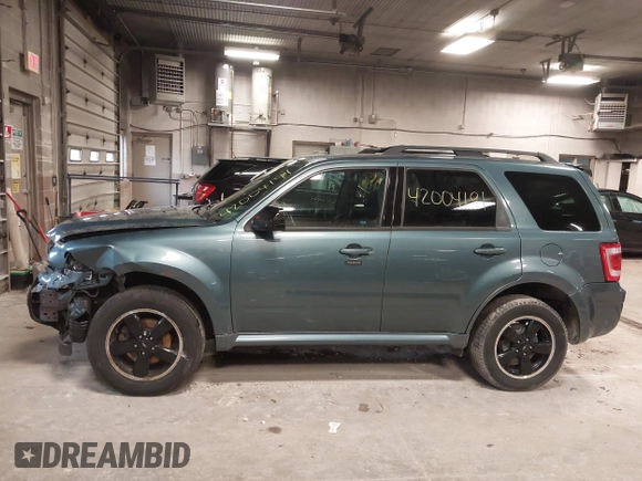 2011 Ford Escape XLT with VIN 1FMCU0D70BKB25088, listed as a IAAI auction lot 42004191 with 200,665 mi miles. Bid and sale history available at carsss.com. Image 14.