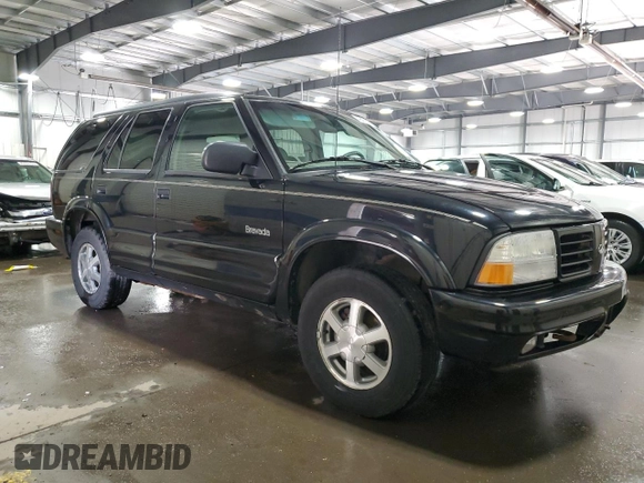 2001 Oldsmobile Bravada z VIN 1GHDT13W912194316, wystawiony jako Copart lot #49438485 z przebiegiem 124 380 mil mil oraz Szkody całkowita. Historia ofert i sprzedaży dostępna na DreamBid. Obrazek 4.