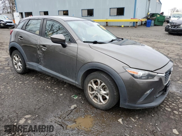 2018 Mazda CX-3 Sport z VIN JM1DKFB77J0312732, wystawiony jako Copart lot #45720065 z przebiegiem 99 866 mil mil oraz Szkoda całkowita • Salvage title. Historia ofert i sprzedaży dostępna na DreamBid. Obrazek 4.