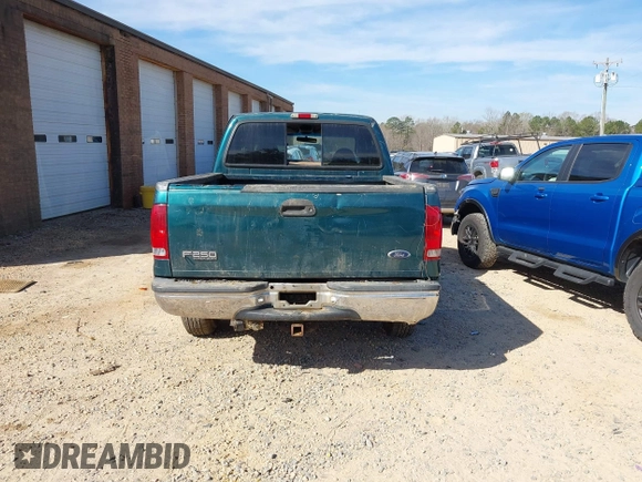 1999 Ford Super Duty F-250 XL with VIN 1FTNW21S2XEE10313, listed as a IAAI auction lot 41825300 with 150,619 mi miles. Bid and sale history available at carsss.com. Image 16.