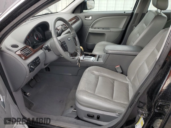 2007 Ford Five Hundred SEL z VIN 1FAHP27167G105884, wystawiony jako Copart lot #85392784 z przebiegiem 231 253 mil mil oraz Szkoda całkowita • Salvage title. Historia ofert i sprzedaży dostępna na DreamBid. Obrazek 7.