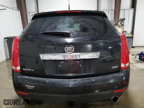 2014 Cadillac SRX Luxury Collection z VIN 3GYFNEE39ES681183, wystawiony jako Copart lot #57165295 z przebiegiem 110 780 mil mil oraz Szkoda całkowita • Salvage title. Historia ofert i sprzedaży dostępna na DreamBid. Obrazek 6.