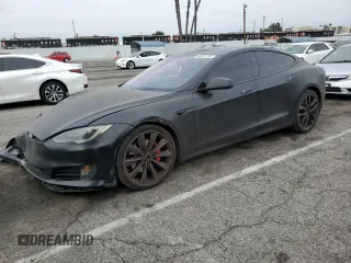 2016 Tesla Model S 90D with VIN 5YJSA1E45GF171765, listed as a Copart auction lot 58501745 with 201,691 mi miles and Salvage title. Bid and sale history available at DreamBid. Image 1.