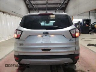 2018 Ford Escape SE with VIN 1FMCU9GD7JUA25403, listed as a Copart auction lot 87158814 with 121,281 mi miles and Salvage Title. Bid and sale history available at carsss.com. Image 6.