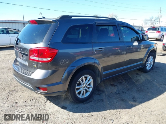 2014 Dodge Journey SXT with VIN 3C4PDCBG6ET192288, listed as a IAAI auction lot 41787594 with 132,973 mi miles. Bid and sale history available at carsss.com. Image 4.