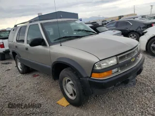 1999 Chevrolet Blazer Trailblazer z VIN 1GNDT13W9X2238417, wystawiony jako Copart lot #80087223 z przebiegiem Nie podano mil oraz Szkoda całkowita • Salvage title. Historia ofert i sprzedaży dostępna na DreamBid. Obrazek 4.