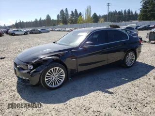 2013 BMW 3 Series 328i with VIN WBA3C1G55DNR45687, listed as a Copart auction lot 53390025 with 129,165 mi miles and Salvage Title. Bid and sale history available at carsss.com. Image 1.