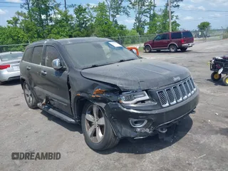 2015 Jeep Grand Cherokee Overland with VIN 1C4RJFCT9FC859740, listed as a IAAI auction lot 42187933 with 231,481 mi miles. Bid and sale history available at carsss.com. Image 1.