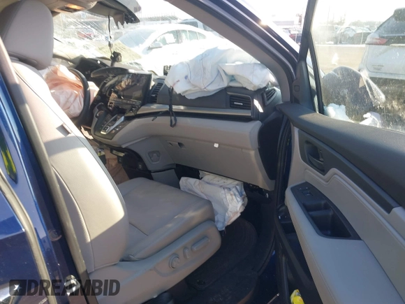 2024 Honda Odyssey EX-L with VIN 5FNRL6H60RB061017, listed as a IAAI auction lot 41399491 with 6,921 mi miles and . Bid and sale history available at DreamBid. Image 5.