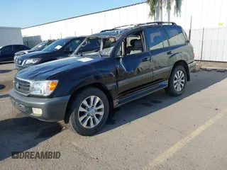 2000 Toyota Land Cruiser z VIN JT3HT05J2Y0101522, wystawiony jako IAAI lot #41965792 z przebiegiem 187 172 mil mil oraz . Historia ofert i sprzedaży dostępna na DreamBid. Obrazek 2.