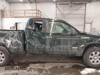 2014 Ford F-150 XL with VIN 1FTFX1ET8EKE32412, listed as a IAAI auction lot 41557331 with 128,744 mi miles. Bid and sale history available at carsss.com. Image 14.