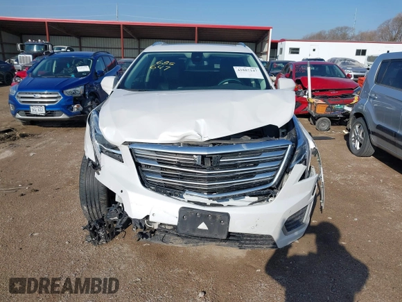 2017 Cadillac XT5 Premium Luxury AWD z VIN 1GYKNERS3HZ284561, wystawiony jako IAAI lot #41887147 z przebiegiem 119 189 mil mil oraz . Historia ofert i sprzedaży dostępna na DreamBid. Obrazek 13.