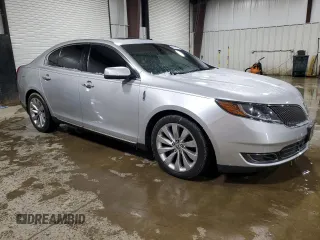2014 Lincoln MKS with VIN 1LNHL9EKXEG608403, listed as a Copart auction lot 45515075 with 155,508 mi miles and Salvage Title. Bid and sale history available at DreamBid. Image 4.