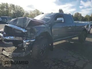 2020 Ram 3500 Laramie with VIN 3C63R3JL3LG240972, listed as a Copart auction lot 77382524 with 99,918 mi miles and Salvage Title. Bid and sale history available at carsss.com. Image 1.