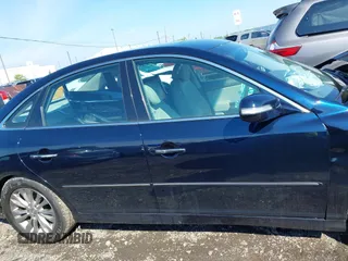 2011 Hyundai Azera Limited z VIN KMHFC4DF9BA518236, wystawiony jako IAAI lot #42376258 z przebiegiem 138 132 mil mil oraz . Historia ofert i sprzedaży dostępna na DreamBid. Obrazek 13.