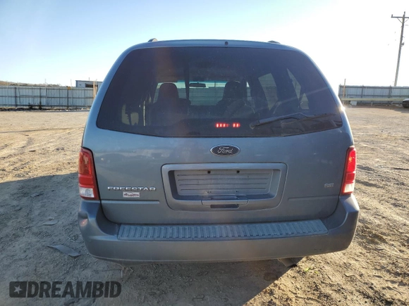 2005 Ford Freestar SE с VIN 2FMZA51675BA44440, выставлен на аукционе Copart как лот 86080294 с пробегом Не указан миль и Списание • Salvage title. История ставок и продаж доступна на DreamBid. Изображение 6.