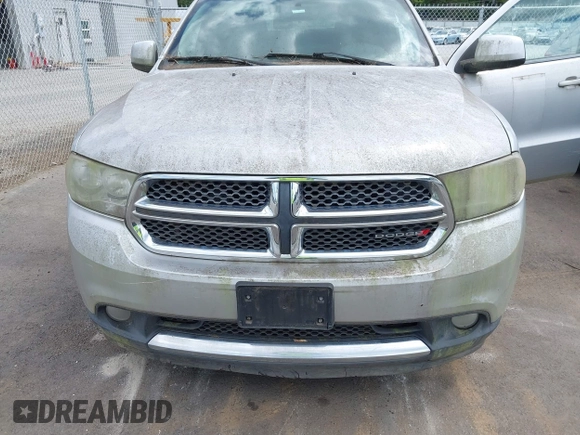 2013 Dodge Durango SXT with VIN 1C4RDHAG4DC571663, listed as a IAAI auction lot 42769759 with 178,033 mi miles and . Bid and sale history available at DreamBid. Image 6.