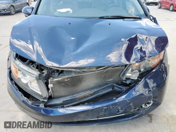 2014 Honda Odyssey Touring with VIN 5FNRL5H97EB037439, listed as a Copart auction lot 62782035 with 153,315 mi miles and Salvage title. Bid and sale history available at DreamBid. Image 12.
