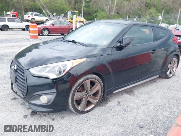 2013 Hyundai Veloster Turbo z VIN KMHTC6AE7DU106831, wystawiony jako IAAI lot #42115348 z przebiegiem 166 914 mil mil oraz . Historia ofert i sprzedaży dostępna na DreamBid. Obrazek 2.