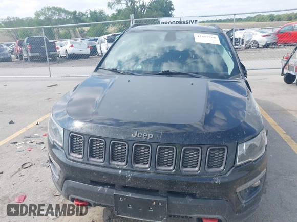 2017 Jeep Compass Trailhawk z VIN 3C4NJDDB6HT631047, wystawiony jako IAAI lot #42457508 z przebiegiem 59 414 mil mil oraz . Historia ofert i sprzedaży dostępna na DreamBid. Obrazek 6.
