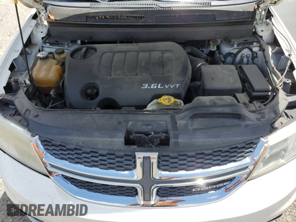 2012 Dodge Journey SXT with VIN 3C4PDCBG5CT135724, listed as a Copart auction lot 56938415 with 180,548 mi miles and Salvage title. Bid and sale history available at DreamBid. Image 12.