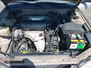 1996 Toyota Camry DX z VIN JT2BG12K3T0381929, wystawiony jako IAAI lot #42336120 z przebiegiem 198 942 mil mil oraz . Historia ofert i sprzedaży dostępna na DreamBid. Obrazek 10.