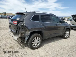 2018 Jeep Cherokee Latitude Plus with VIN 1C4PJMLX0JD562180, listed as a Copart auction lot 57631285 with 105,923 mi miles and Salvage title. Bid and sale history available at DreamBid. Image 3.