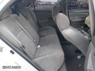 2004 Toyota Corolla CE with VIN 1NXBR32E64Z196304, listed as a IAAI auction lot 41068676 with 121,637 mi miles. Bid and sale history available at carsss.com. Image 8.