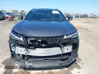 2021 Lexus UX 250h F Sport z VIN JTHR9JBH3M2052706, wystawiony jako IAAI lot #42321784 z przebiegiem 23 290 mil mil oraz . Historia ofert i sprzedaży dostępna na DreamBid. Obrazek 13.