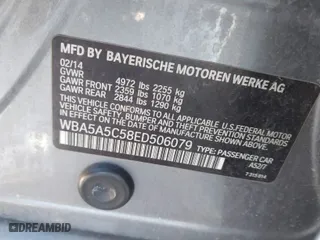 2014 BMW 5 Series 528i with VIN WBA5A5C58ED506079, listed as a IAAI auction lot 41236765 with 157,283 mi miles. Bid and sale history available at carsss.com. Image 9.