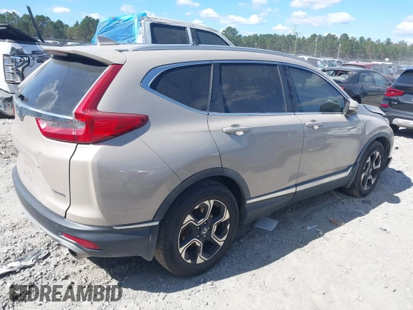 2018 Honda CR-V Touring with VIN 5J6RW1H98JL000031, listed as a IAAI auction lot 40605651 with 129,516 mi miles and . Bid and sale history available at DreamBid. Image 4.