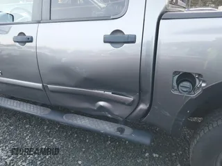 2014 Nissan Titan S with VIN 1N6AA0EC4EN500528, listed as a IAAI auction lot 41323510 with 31,164 mi miles and . Bid and sale history available at DreamBid. Image 6.