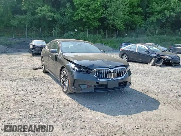 2024 BMW 5 Series 530i xDrive with VIN WBA53FJ04RCP87607, listed as a Copart auction lot 58768065 with 11,596 mi miles and Salvage title. Bid and sale history available at DreamBid. Image 13.