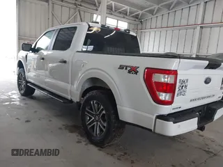 2023 Ford F-150 XL with VIN 1FTEW1EP7PKE20482, listed as a IAAI auction lot 41848669 with 27,933 mi miles. Bid and sale history available at carsss.com. Image 3.
