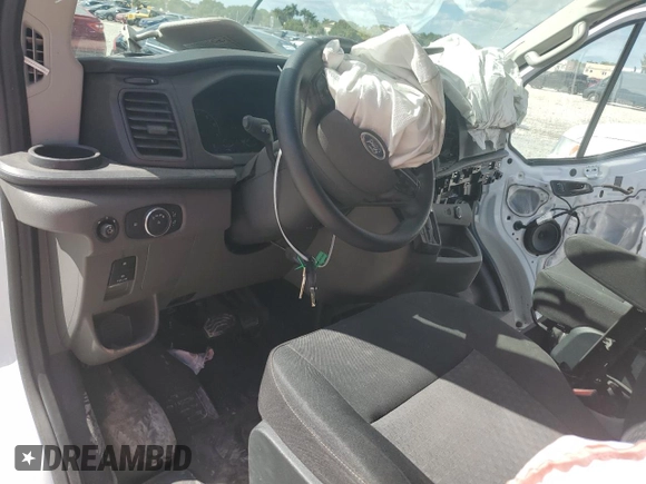 2022 Ford Transit Cargo with VIN 1FTBR1Y82NKA24178, listed as a Copart auction lot 44745704 with 15,951 mi miles and . Bid and sale history available at DreamBid. Image 8.