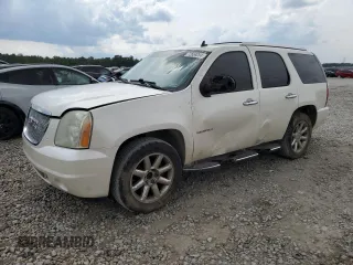 2011 GMC Yukon Denali with VIN 1GKS1EEFXBR313625, listed as a Copart auction lot 72634294 with 129,834 mi miles and Salvage Title. Bid and sale history available at carsss.com. Image 1.